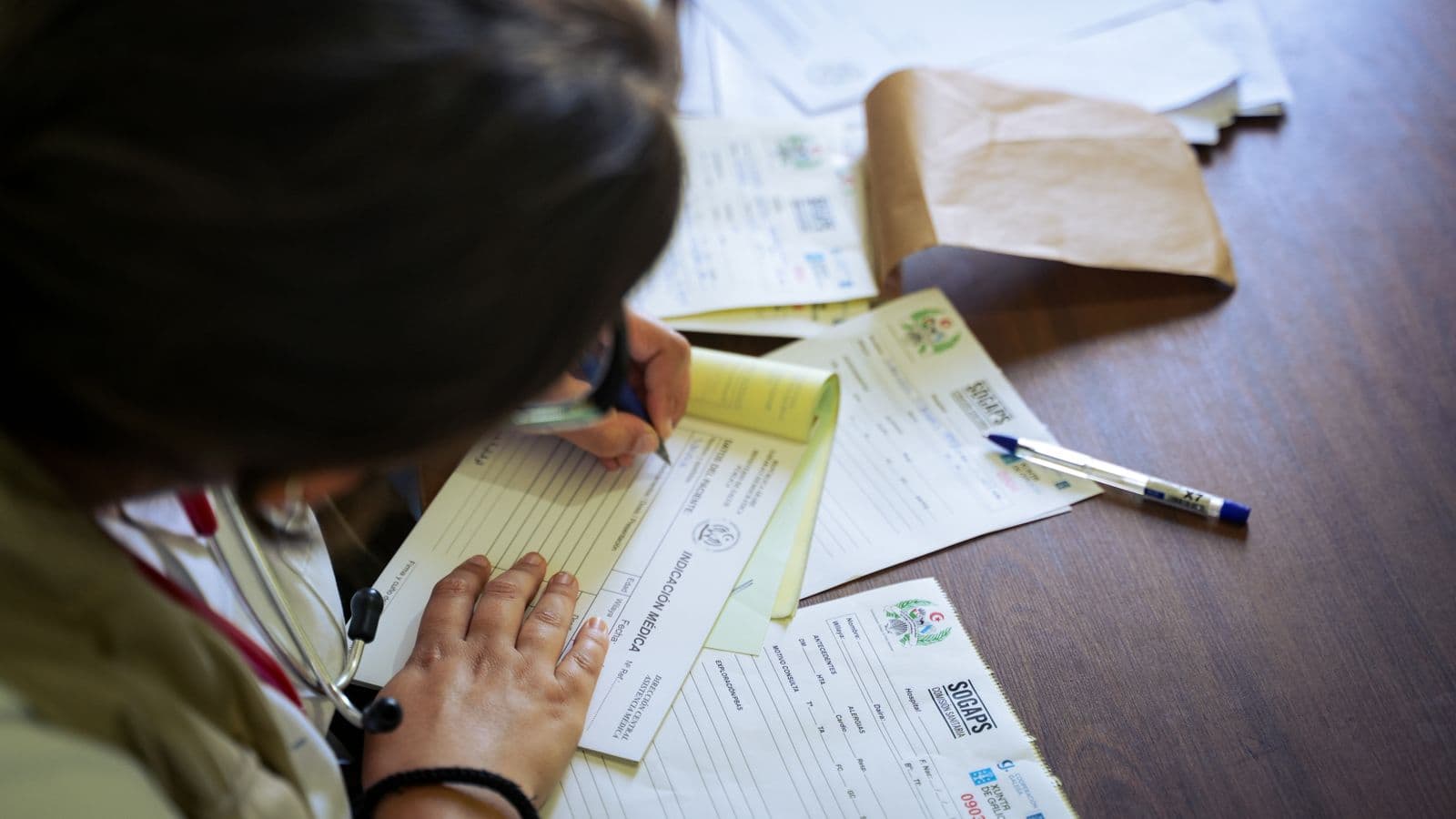 Patient filling a registration form on a phone via a secure link